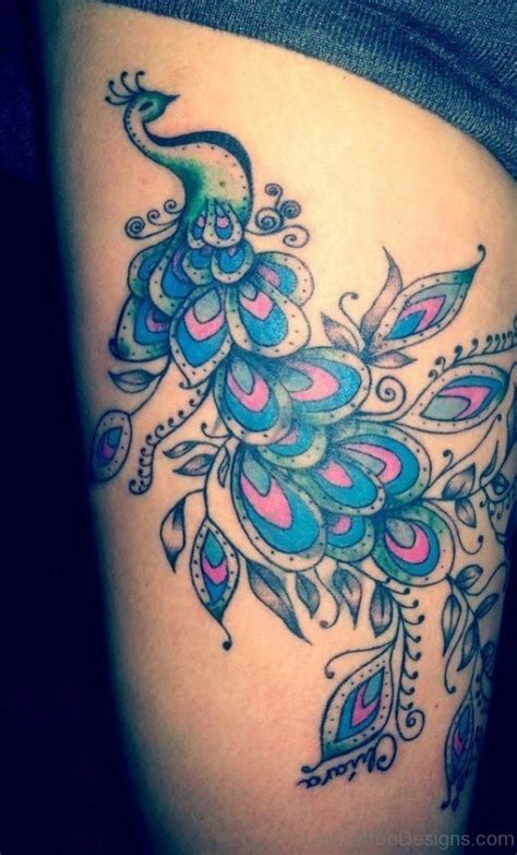 49 Stunning Peacock Tattoos On Thigh Leg Tattoo Designs