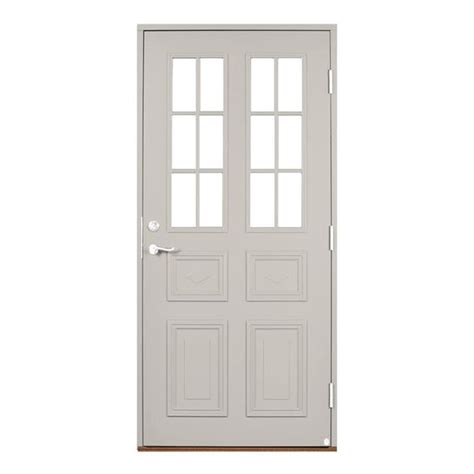 A White Door With Three Panes On The Front And Side Panels Against A