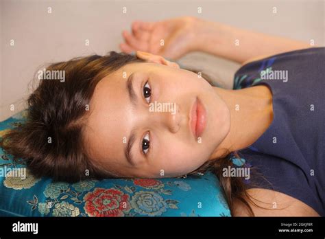 Close Up Portrait Of A Bright Cute Dark Haired Teenage Girl 12 Years