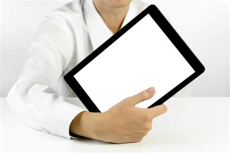 Premium Photo Businessman Holding A Tablet On White Background