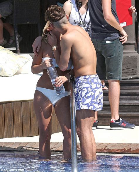 Sam Faiers shows off svelte figure in white bikini as she puts on a VERY public PDA with fiancé