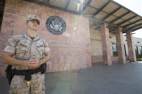 A Us Marine Security Guard Patrols The Us Embassy In Bamako Mali