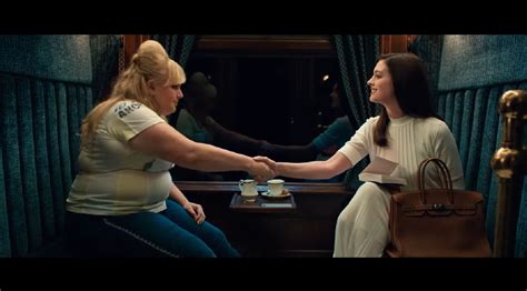 First Look At Anne Hathaway And Rebel Wilson In The Hustle Trailer