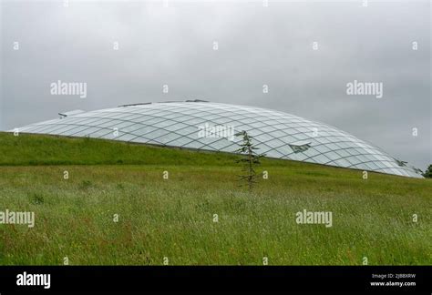 Futuristic Conservatory Dome Of Glass Panels In Steel Joists Set Into