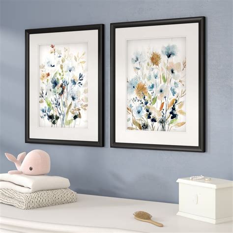 Or this set of framed flower prints that you can place on a blank wall that's currently begging ...