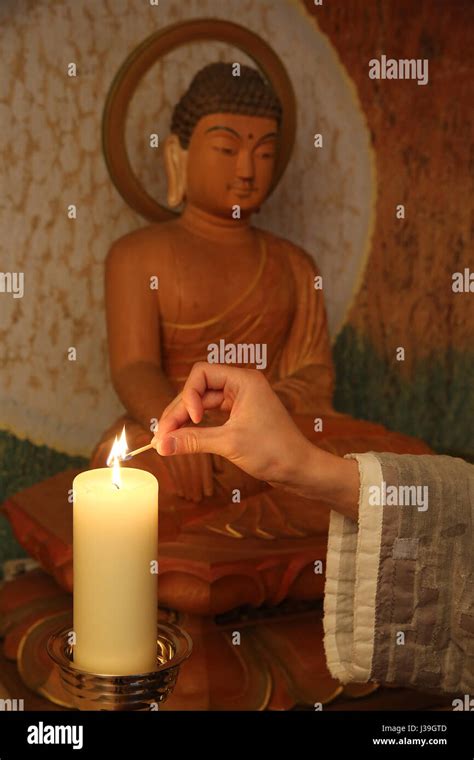 Buddhist Monk Lighting Candles Hi Res Stock Photography And Images Alamy