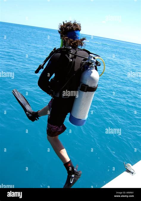 Scuba Diver Jumping Into Water Hi Res Stock Photography And Images Alamy