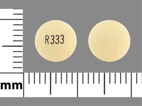 R Pill Yellow Round Pill Identifier