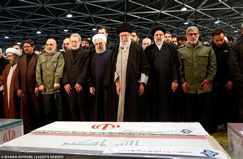 Iran's supreme leader Ali Khamenei prays over coffin of Qassem ...