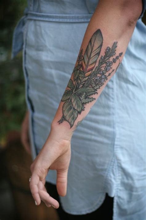 Wildflowers And Feather Forearm Tattoo Tattooimages Biz