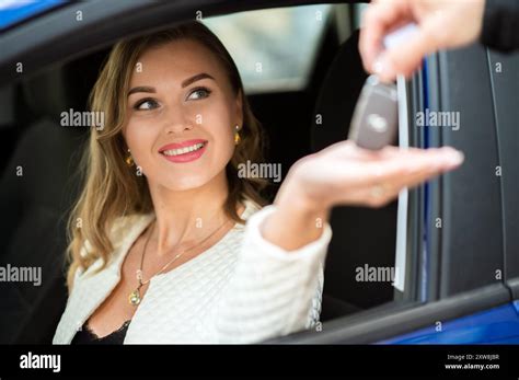 Keys Handing Hi Res Stock Photography And Images Alamy