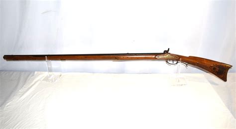 At Auction Flintlock Octagon Barrel Long Rifle