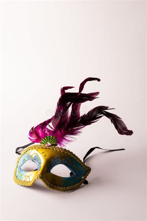 Composition Of Colourful Mardi Gras Carnival Mask With Feathers On