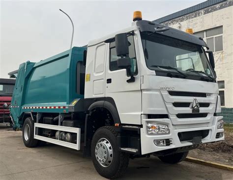 Sinotruk Howo X Hp Cbm Tons Waste Compactor Truck Sinotruk