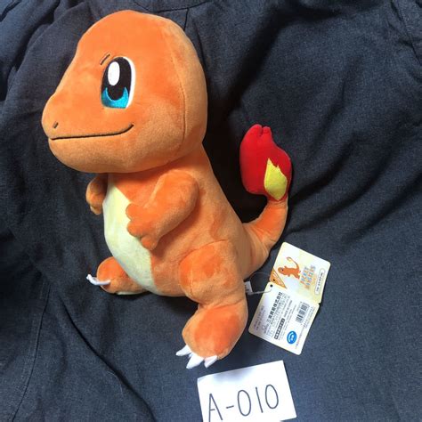 Yahooオークション ポケモン ヒトカゲ ぬいぐるみ Mサイズ 約30cm A