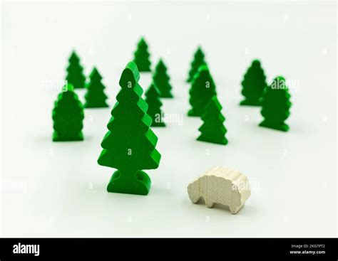 Wooden Figures Trees And Sheep On A White Background Stock Photo Alamy