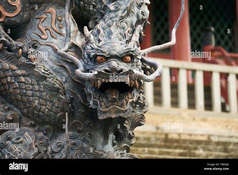 A Fierce Bronze Dragon Statue Stands In Front Of The Steps Leading Up To Kiyomizu Temple S