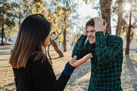 A Young Couple Arguing Outdoors Stock Photo Image Of Expression Girl