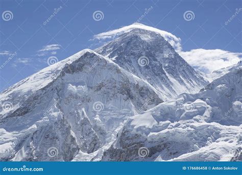 Mount Everest With Clouds On Top Himalaya Mountain Range Stock Photo