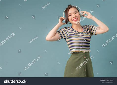 Headshot Mature Woman Enjoying Listening Music Stock Photo 2028779024