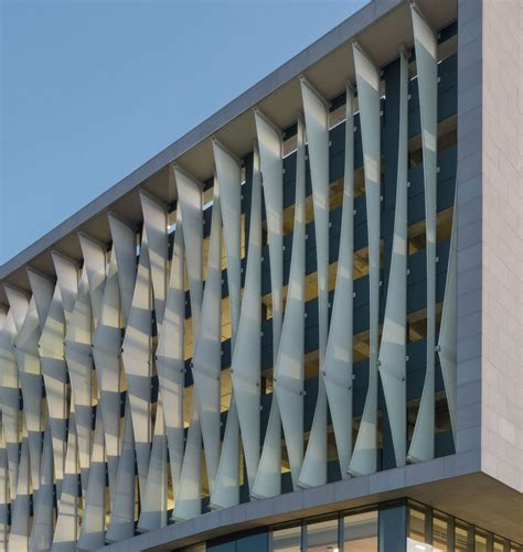 Vertical PTFE/VCP shade sails/fins create dynamic look. TensileInc.com | Architecture building ...