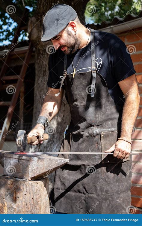 Blacksmith Forging Red Hot Metal With Hammer Blacksmith Concept Stock Image Image Of Bending