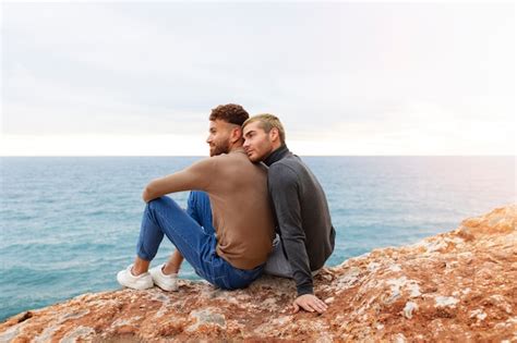 Free Photo Affectionate Gay Couple Spending Time On The Beach Together