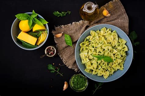 Premium Photo Vegan Farfalle Pasta In A Basil Spinach Sauce With Garlic