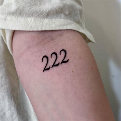 Number 222 Tattoo Located On The Inner Forearm