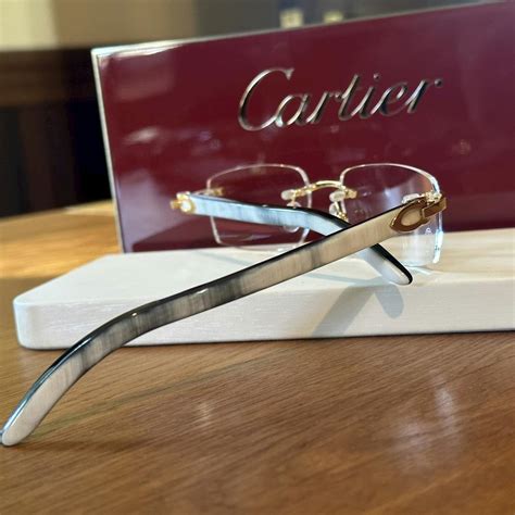 Cartier Ct0046o 001 White Buffalo Horn Rimless Glasses Grailed