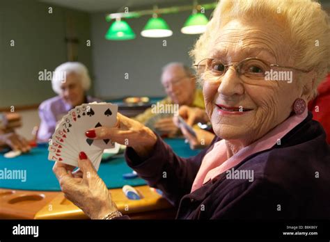 Senior adults playing bridge Stock Photo - Alamy