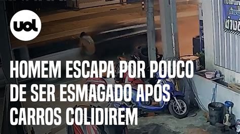 Homem escapa por pouco de ser esmagado após carros colidirem veja