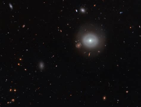 Hubble Spots Largest Einstein Ring Yet Nicknamed The Molten Ring