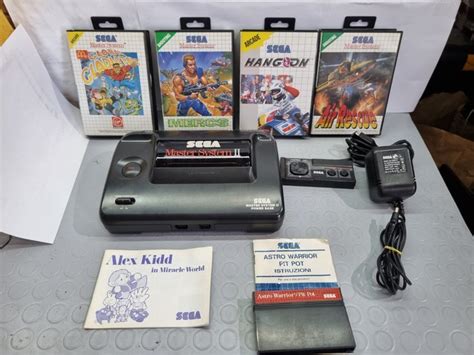 1 Sega Master System II - Console with games (6) - Catawiki