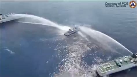 China Collides With Philippines Ship Hits It With Water Cannon Video