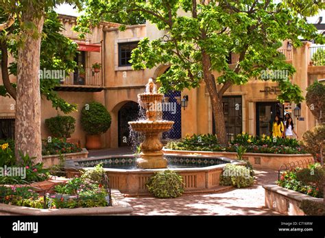 Spanish style tiered fountain patio courtyard Stock Photo - Alamy