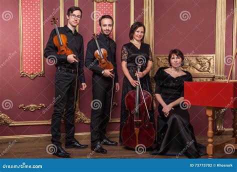 Classical Music Quartet Posing after the Concert. Stock Photo - Image ...