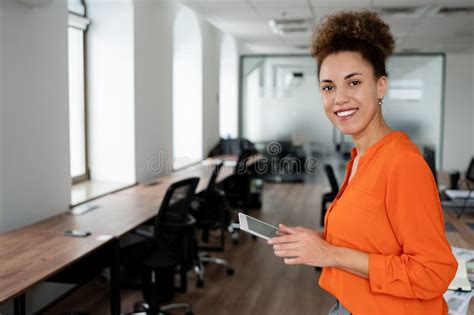 Mature Business Woman Looking At The Camera In A Workplace Meeting Area Stock Image Image Of