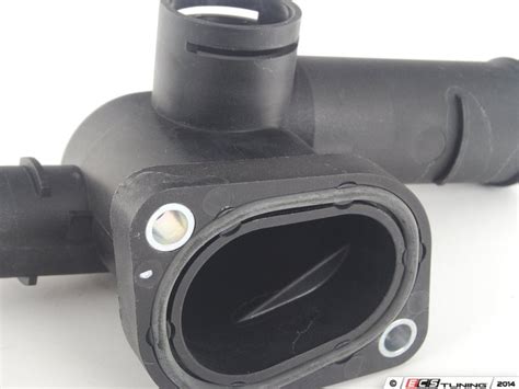 Genuine Volkswagen Audi - 06A121132AG - Coolant Flange (06A 121 132 AG)