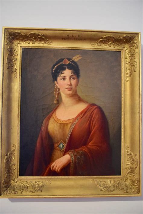 A Portrait Of A Woman In Red And Gold