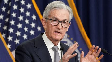 Us Fed Holds Key Interest Rate Steady Signals Three Cuts In Mint