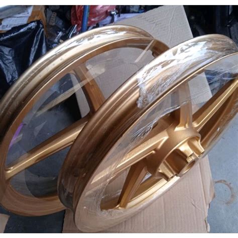 Jual VELG SUPRA 125 DOBLE DISK BLADE NEW REPAINT GOLD Shopee Indonesia