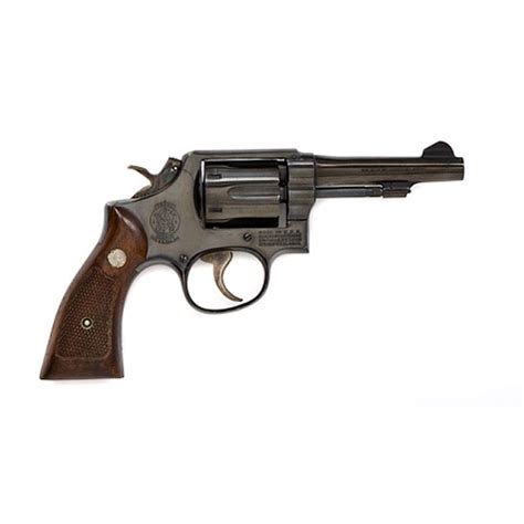 * Smith & Wesson Model 10 Revolver, - auctions & price archive