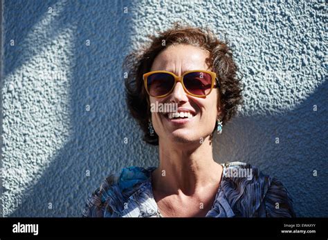 A Fashionable Mature Woman Smiling With Sunglasses On Stock Photo Alamy
