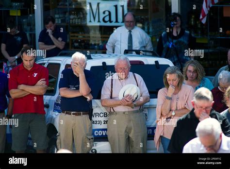 People Pause For Prayer During A Vigil For The Victims Of The Thomas