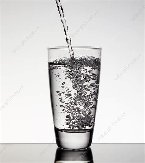 Water Pouring Into Glass Stock Image F005 3502 Science Photo Library