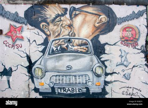 A Painted Mural Depicting Leonid Brezhnev And Erich Honecker Kissing At