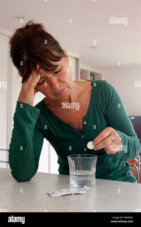 Mature Woman Preparing Soluble Painkillers Stock Photo Alamy