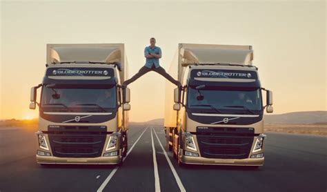 Jean-Claude Van Damme Does Epic Splits Between Reversing Trucks ...