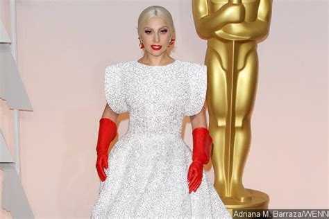 Oscars 2015 Lady Gagas Red Gloves On Red Carpet Spark Memes